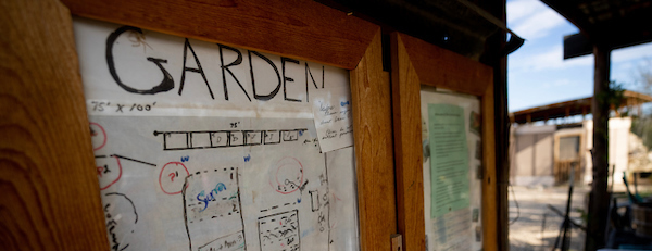 News board outside with a word written in large letters 'Garden'