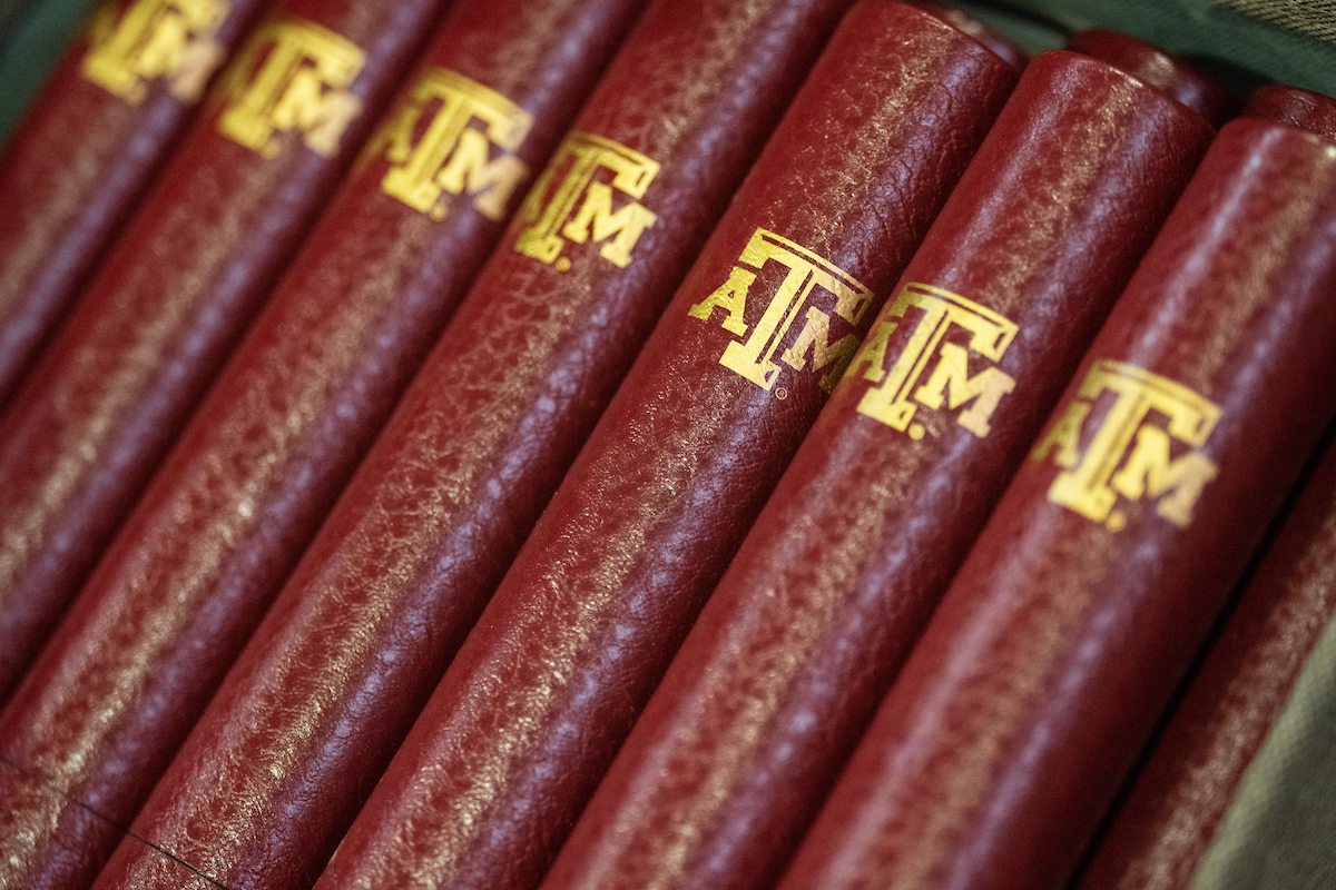 Texas A&M University diplomas in a stack